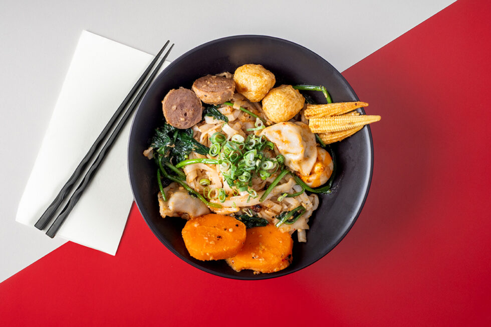Overhead commercial food photograph of a colourful Asian noodle dish professionally styled for restaurant branding and menu photography in Adelaide.