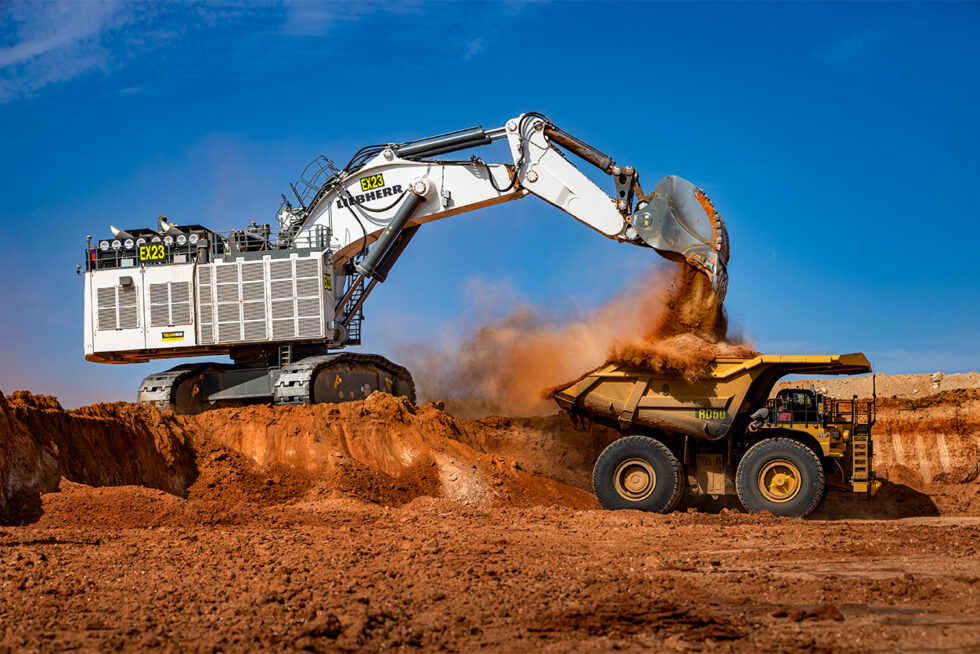 Liebherr excavator loading a Caterpillar haul truck at the Atlas-Campaspe Mineral Sands Mine near Balranald, NSW.